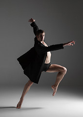 Image showing The young attractive modern ballet dancer on white background