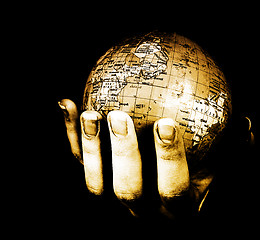 Image showing Globe in a girl\'s hands
