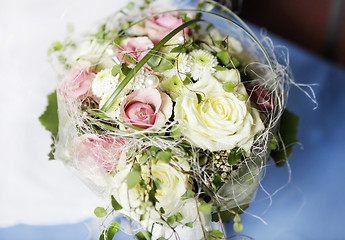 Image showing Bridal bouquet of yellow and pink roses