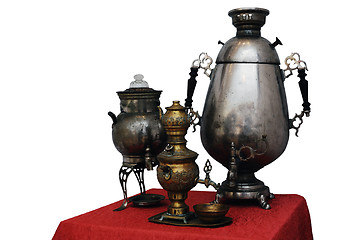 Image showing three old Russian samovar on a white background