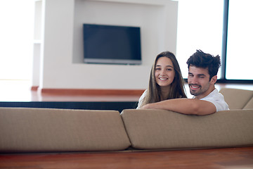 Image showing relaxed young couple at home staircase