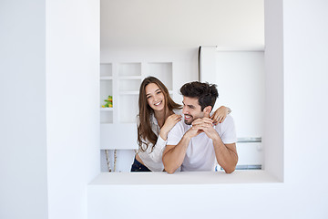 Image showing relaxed young couple at home staircase