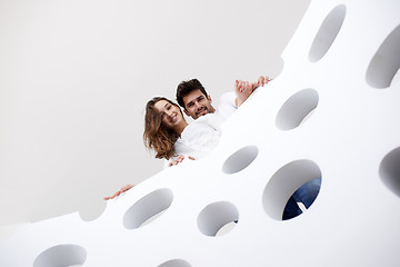 Image showing relaxed yung couple at home  stairs