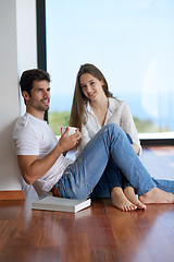 Image showing relaxed young couple at home staircase