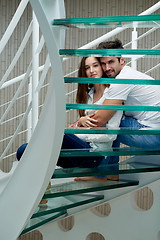 Image showing relaxed yung couple at home  stairs