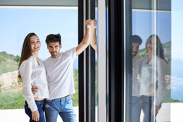 Image showing relaxed young couple at home staircase