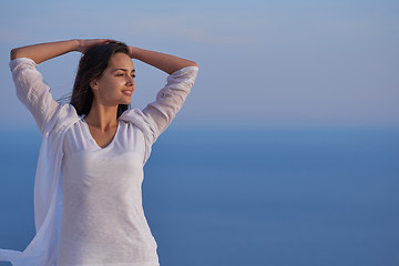 Image showing young woman enjoy sunset