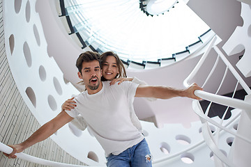 Image showing relaxed yung couple at home  stairs