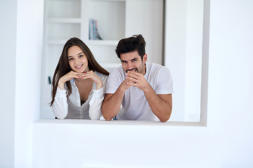 Image showing relaxed young couple at home staircase