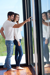 Image showing relaxed young couple at home staircase