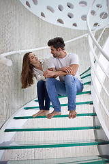 Image showing relaxed yung couple at home  stairs