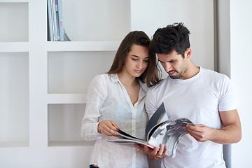 Image showing relaxed young couple at home staircase