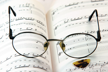 Image showing spectacles on book