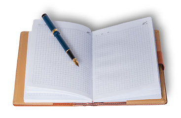 Image showing Fountain pen on top of a notebook