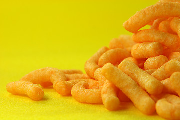 Image showing snacks in yellow