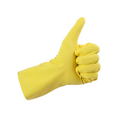 Image showing Yellow glove for cleaning show thumbs up