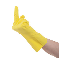 Image showing Yellow glove middle finger