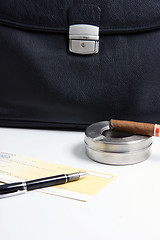 Image showing cigar and business