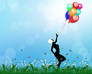 Image showing Lady playing with balloons