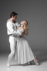 Image showing Two young ballet dancers practicing. attractive dancing performers  in white 