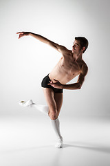 Image showing The young attractive modern ballet dancer on white background