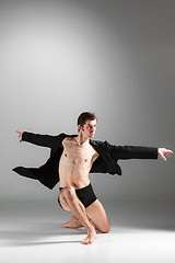 Image showing The young attractive modern ballet dancer on white background