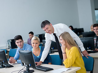 Image showing students with teacher  in computer lab classrom