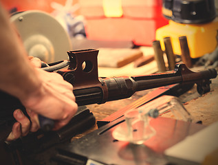 Image showing repair of the old German submachine gun MP-38