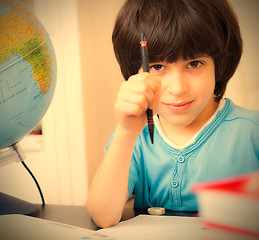 Image showing schoolboy doing homework
