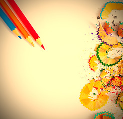 Image showing colored shavings and pencils on white