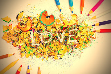 Image showing The word LOVE on the background from pencil shavings
