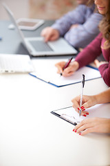 Image showing hands with a  pen