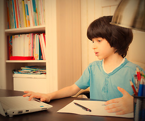 Image showing schoolboy doing homework