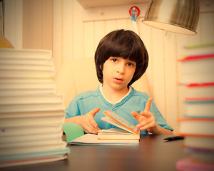 Image showing child reading a book