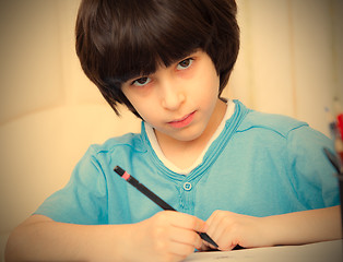 Image showing schoolboy doing homework