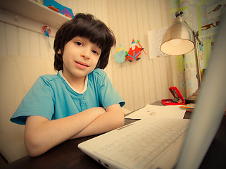 Image showing schoolboy doing homework