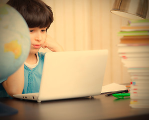 Image showing schoolboy doing homework