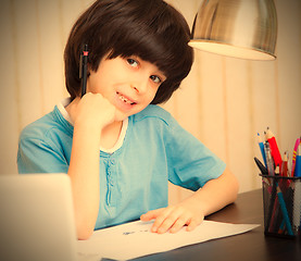 Image showing child doing homework