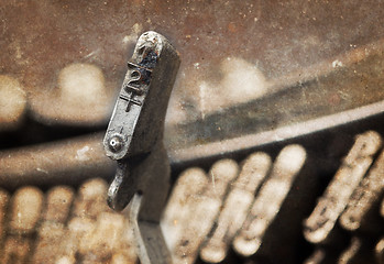 Image showing 1/2 hammer - old manual typewriter - warm filter