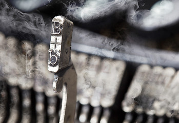 Image showing B hammer - old manual typewriter - mystery smoke