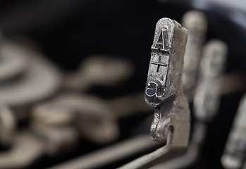 Image showing A hammer - old manual typewriter