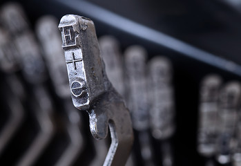 Image showing E hammer - old manual typewriter - cold blue filter