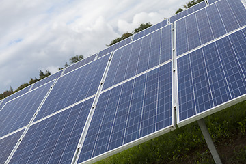 Image showing Field with blue siliciom solar cells alternative energy