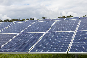 Image showing Field with blue siliciom solar cells alternative energy