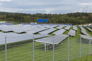 Image showing Field with blue siliciom solar cells alternative energy