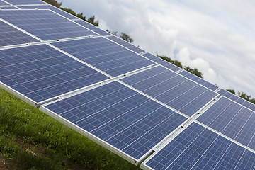 Image showing Field with blue siliciom solar cells alternative energy