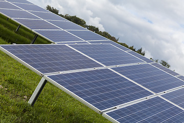 Image showing Field with blue siliciom solar cells alternative energy