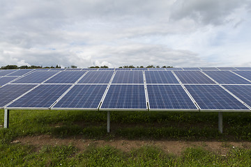 Image showing Field with blue siliciom solar cells alternative energy