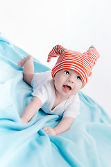 Image showing Baby in hat lying