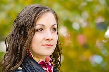 Image showing Portrait of a single-minded young girl in autumn clothes